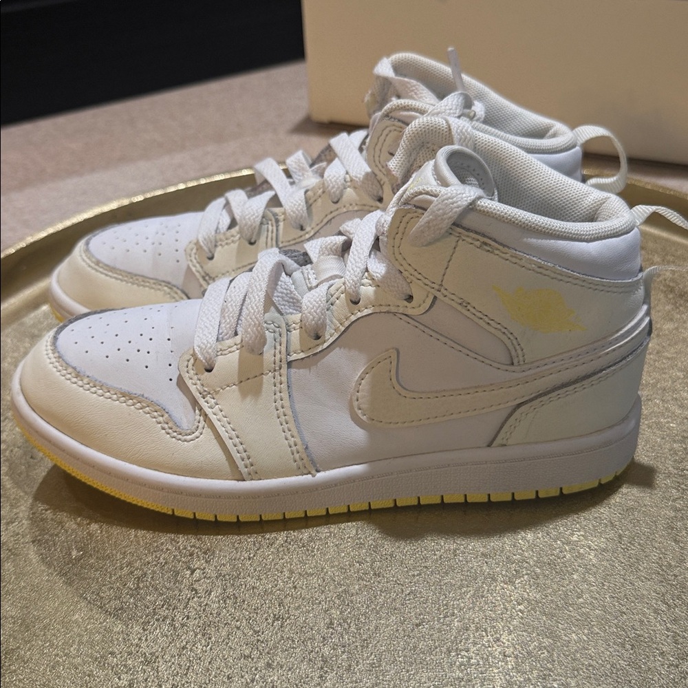 White and Yellow High-Top Jordan 1s Sneakers
Final Sale